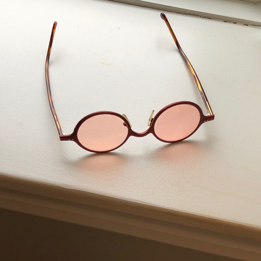 Jean LaFont round reddish rose tinted sunglasses in excellent condition